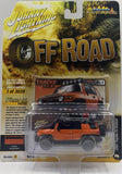 1/64 JOHNNY LIGHTNING OFF ROAD 2007 TOYOTA FJ CRUISER ORANGE/BLACK NEW ON CARD