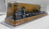 1/87 DIECAST MASTERS CAT SEMI TRACTOR WITH LOWBOY TRAILER AND CAT DIECAST MACHINES BLUE NEW IN BLISTER PACK