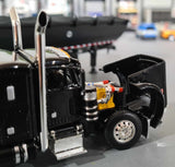 1/64 DCP PETERBILT 379 BLACK/BLACK STRETCHED CHASSIS WITH WORKING TIPPER TRAILER 60-1434