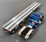 DCP / FIRST GEAR 1/64  PETERBILT 359 BLUE/BLACK WITH FLAT TOP TRAILER *****60-1621