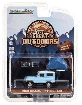 1/64 GREENLIGHT 1969 NISSAN PATROL LIGHT BLUE WITH OPTIONAL TENT TO GO ON ROOF NEW ON CARD