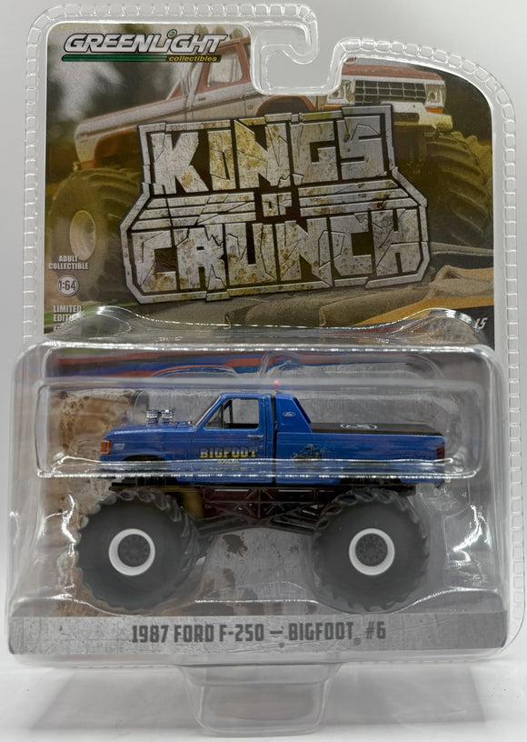 GREENLIGHT 1987 FORD F-250 KING OF CRUNCH BIGFOOT #6 BLUE NEW ON CARD