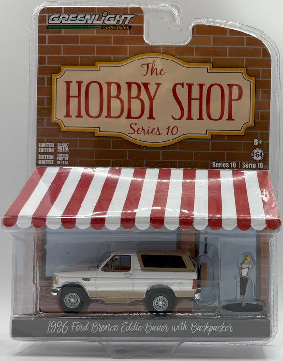 GREENLIGHT 1996 FORD BRONCO EDDIE BAUER WITH BACKPACKER WHITE NEW ON CARD