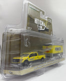 GREENLIGHT 2018 NISSAN TITAN XD PRO-4X WITH ENCLOSED CAR HAULER HITCH AND TOW YELLOW/BLACK NEW ON CARD