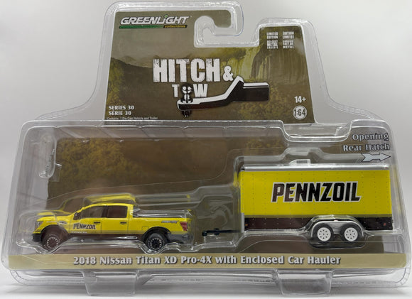 GREENLIGHT 2018 NISSAN TITAN XD PRO-4X WITH ENCLOSED CAR HAULER HITCH AND TOW YELLOW/BLACK NEW ON CARD