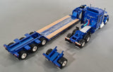 1/64 DCP / FIRST GEAR WESTERN KENWORTH W990 WITH TRI AXLE HEAVY HAULER TRAILER 60-1723