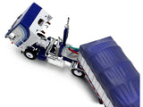 Dcp / First Gear 1/64 Peterbilt Model 352 COE 110" Sleeper and 53' Wilson Roadbrute Flatbed with Covered Wagon in White and Blue  **60-2057