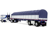 Dcp / First Gear 1/64 Peterbilt Model 352 COE 110" Sleeper and 53' Wilson Roadbrute Flatbed with Covered Wagon in White and Blue  **60-2057