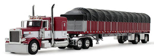 Dcp / First Gear 1/64  Peterbilt Model 389 with 63" Flat Top Sleeper and 53' Wilson Roadbrute Flatbed with Covered Wagon in Maroon and White **60-2058