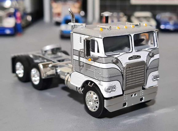 1/64 DCP FREIGHTLINER COE IN SILVER/WHITE PRIME MOVER ONLY