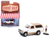 GREENLIGHT 1996 FORD BRONCO EDDIE BAUER WITH BACKPACKER WHITE NEW ON CARD