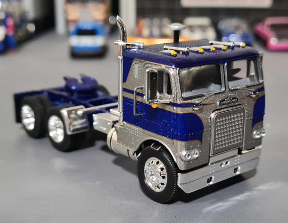 1/64 DCP FREIGHTLINER COE IN BLUE/SILVER PRIME MOVER ONLY