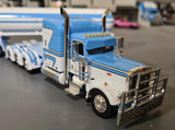 1/64 DCP / FIRST GEAR PETERBILT 389 TRI DRIVE IN BLUE/WHITE WITH LPG TRI AXLE TANKER TRAILER 60-1996