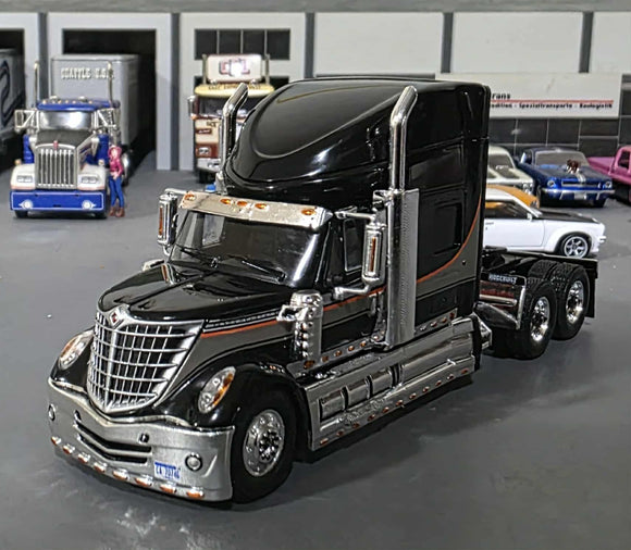 1/64 SCALE IXO INTERNATIONAL LONESTAR PRIME MOVER IN BLACK/SILVER
