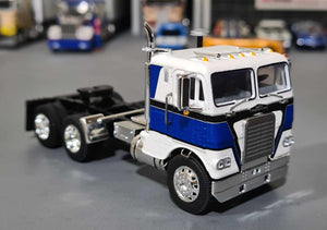 1/64 DCP FREIGHTLINER COE IN WHITE/BLUE/BLACK PRIME MOVER ONLY