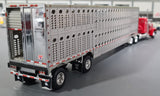 1/64 DCP / FIRST GEAR PETERBILT 359 RED WITH SPREAD LIVESTOCK TRAILER