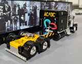 1/64 SCALE DCP / FIRST GEAR BLACK AC/DC PWR UP PETERBILT WITH DROP DECK TRAILER