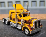 1/87 SCALE BREKINA HO PETERBILT WITH SLEEPER IN YELLOW WITH BROWN STRIPES