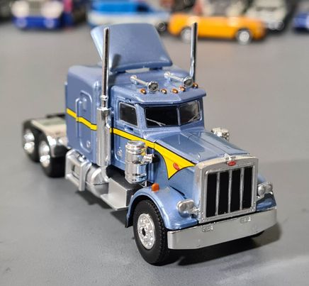 1/87 SCALE BREKINA HO PETERBILT WITH SLEEPER IN BLUE AND YELLOW