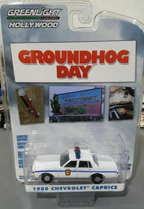 1/64 GREENLIGHT GROUNDHOG DAY 1980 CHEV POLICE CAR FROM THE MOVIE NEW ON CARD