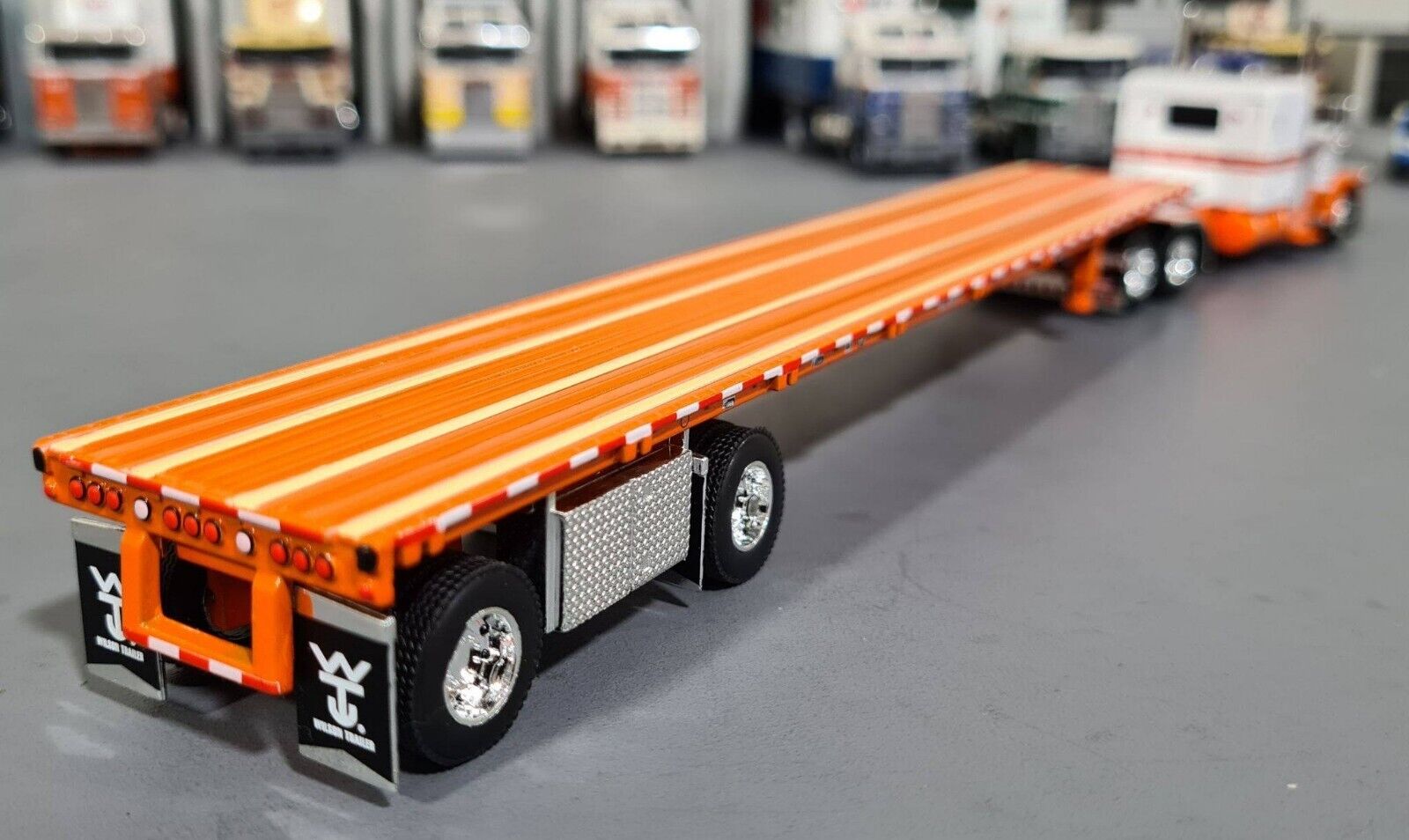 1/64 DCP / FIRST GEAR PETERBILT 389 SRD ORANGE/WHITE WITH ROADBRUTE TR –  TUFFTRUCKS SCALE MODELS